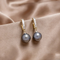 Elegant earrings with pearls and zirconia - Blue